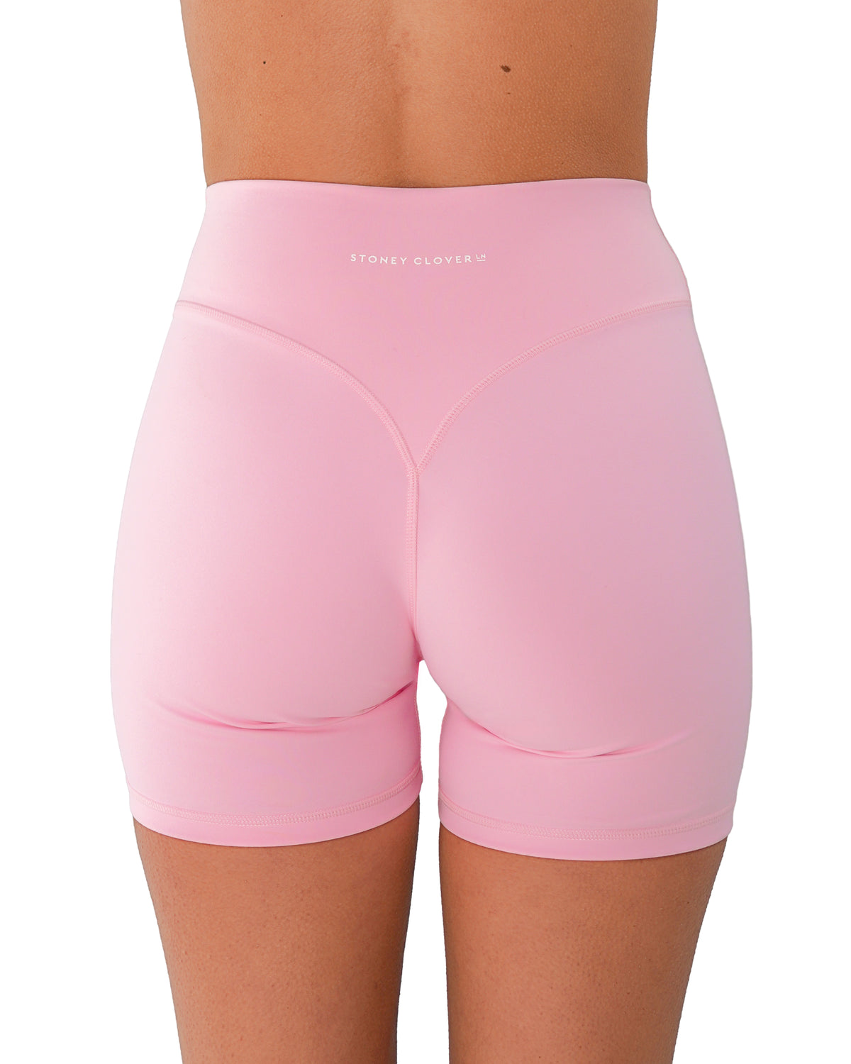 back view of SCL bridge short in soft pink