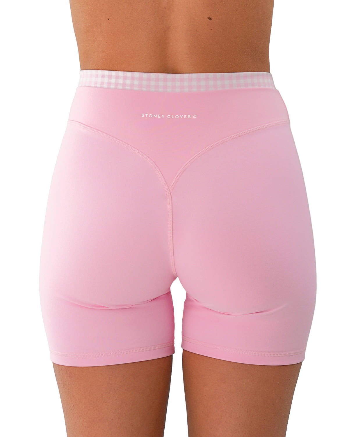 back view of SCL layered sculpt short in soft pink & gingham