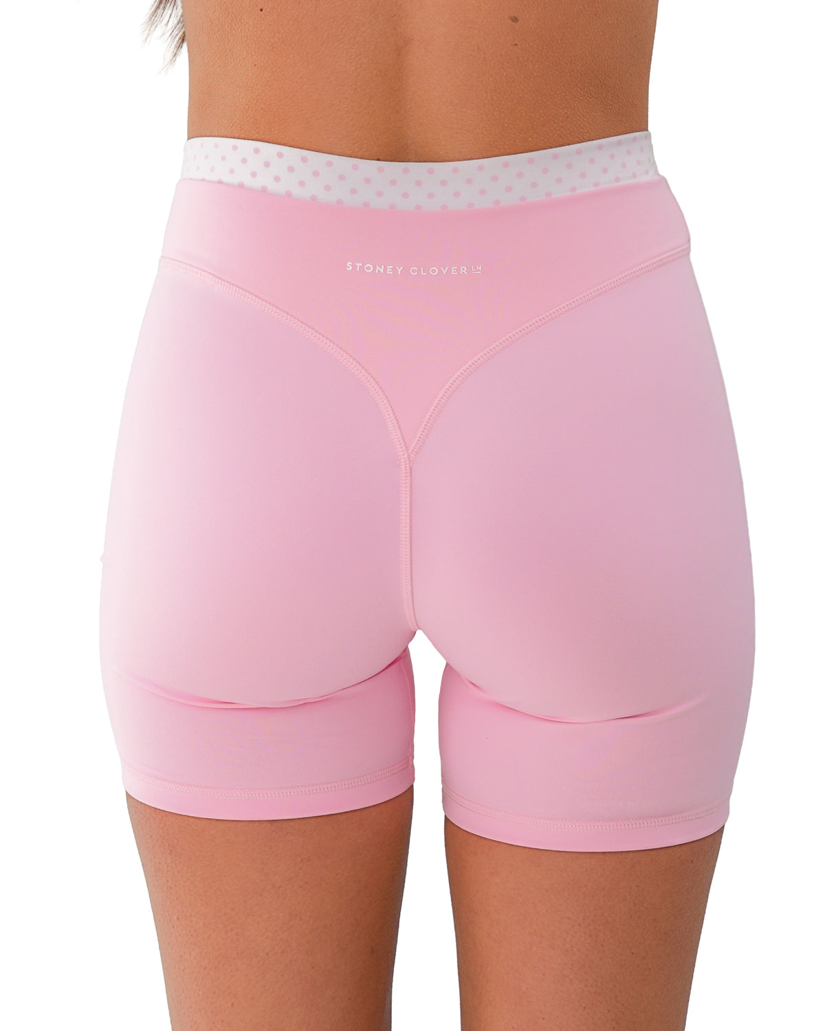 back view of SCL layered sculpt short in soft pink & polka dots
